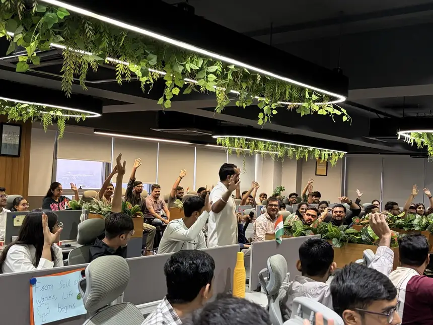Impero IT Services employees raising hands during Anand Shrivastava's AI training